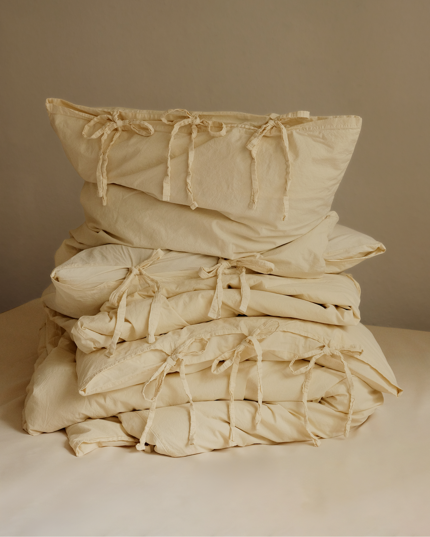 THE BOW - PILLOW COVER PERCALE, PASTELLO WHIPPED BUTTER 80x80cm